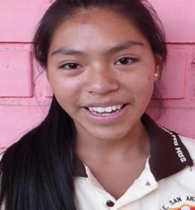 Young female peruvian student looking at camera
