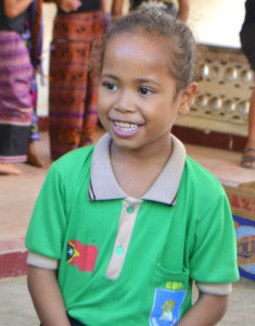Timorse girl smiling at camera