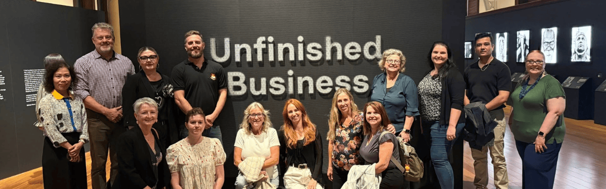 Team at Unfinished Business exhibition